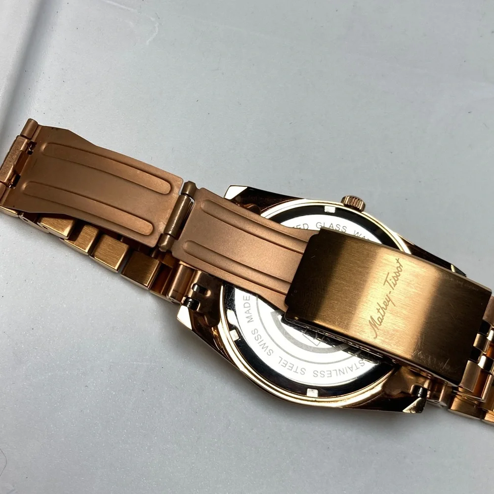 Mathey Tissot H709 rose gold tone, white textured dial, new battery, stainless